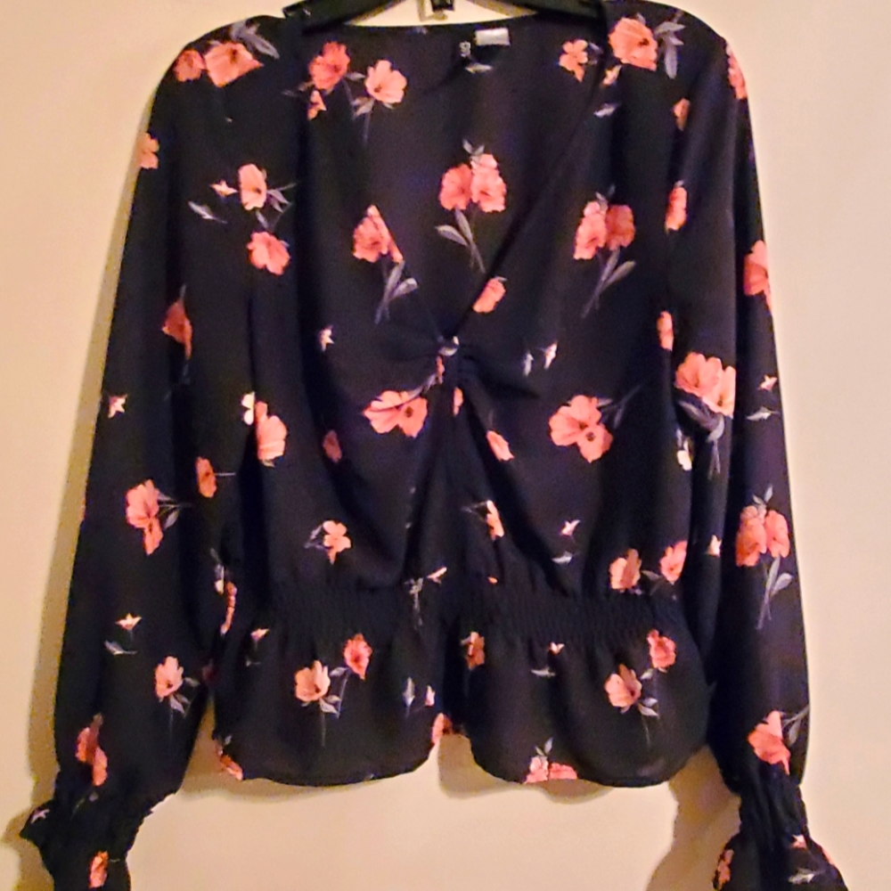 Floral peplum style blouse